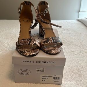 Like new size 7.5 GB Philosophy multi colored heels. Only worn once.